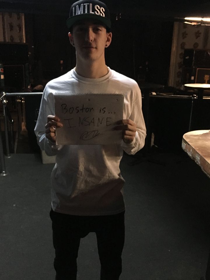Matt Young holding a notepad: Boston is… INSANE