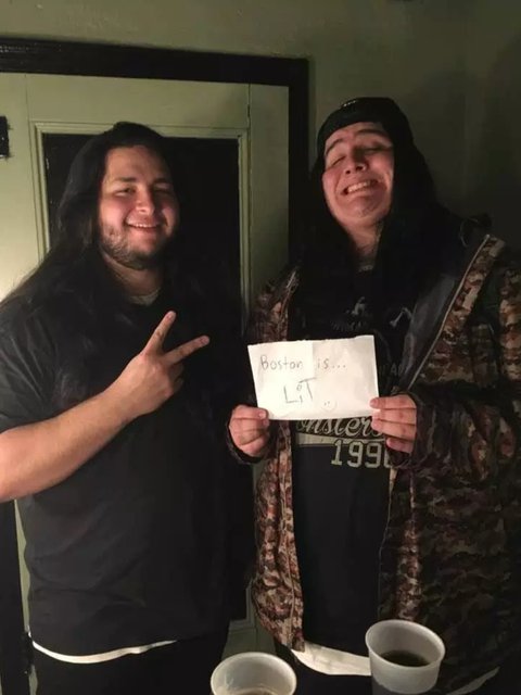 Yookie holding a notepad: Boston is… LIT